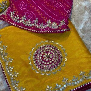 Vibrant Yellow Gota Patti Saree with Pink Bandhani Blouse